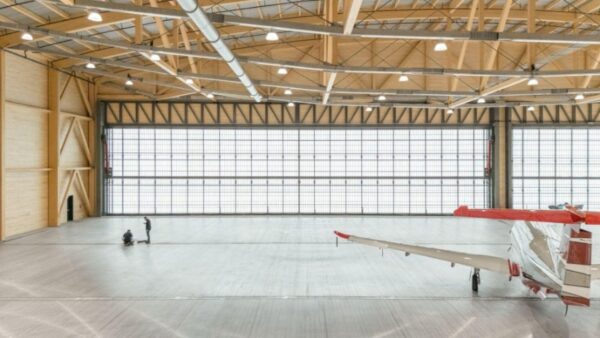 Inside an aircraft hangar, showcasing the many materials used in these projects.