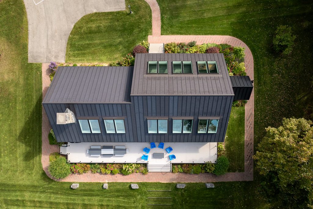 LakesideReno_extdrone Aerial view of a new home renovation by Silver Maple construction in Vermont.